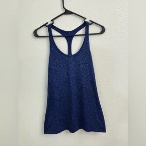 Bundle of 5 workout tanks. 4 Nike, 1 Fabletics